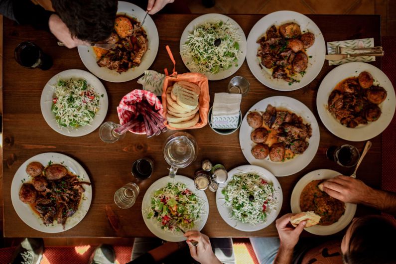Family Meals - white plates with assorted foods