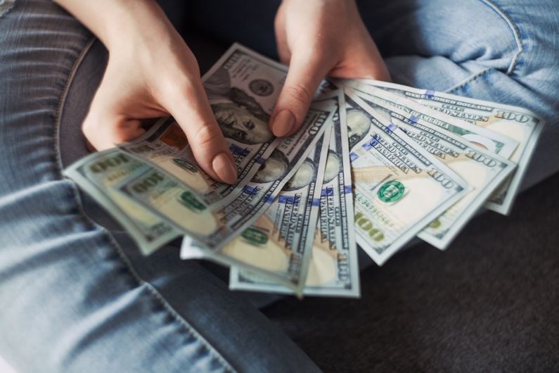 Money - fan of 100 U.S. dollar banknotes
