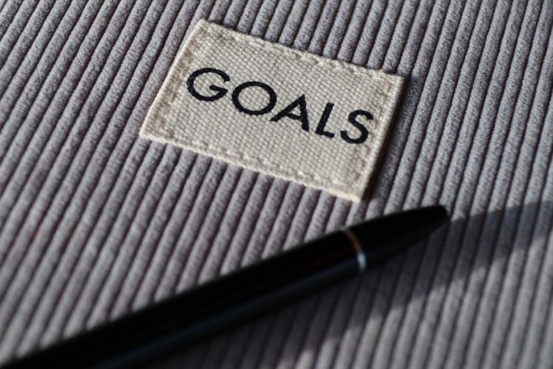 Goals - black and silver pen on gray textile