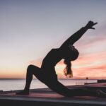 Yoga - silhouette photography of woman doing yoga