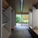 VR - a building with a wood floor and a wood roof