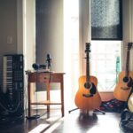 Instrument - several guitars beside of side table