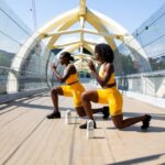 Fitness - woman in yellow shorts sitting on yellow chair
