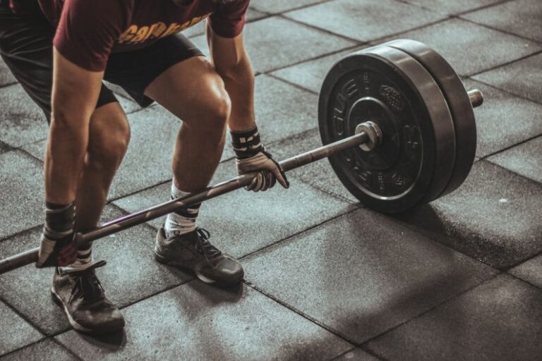 Strength Training - person weightlifting painting