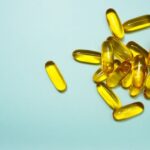Omega-3 - brown and yellow medication tablets
