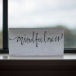 Mindfulness - mindfulness printed paper near window