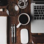 Work - cup of coffee near MacBook Pro