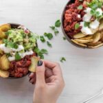 Nail Health - person eating vegetable dish