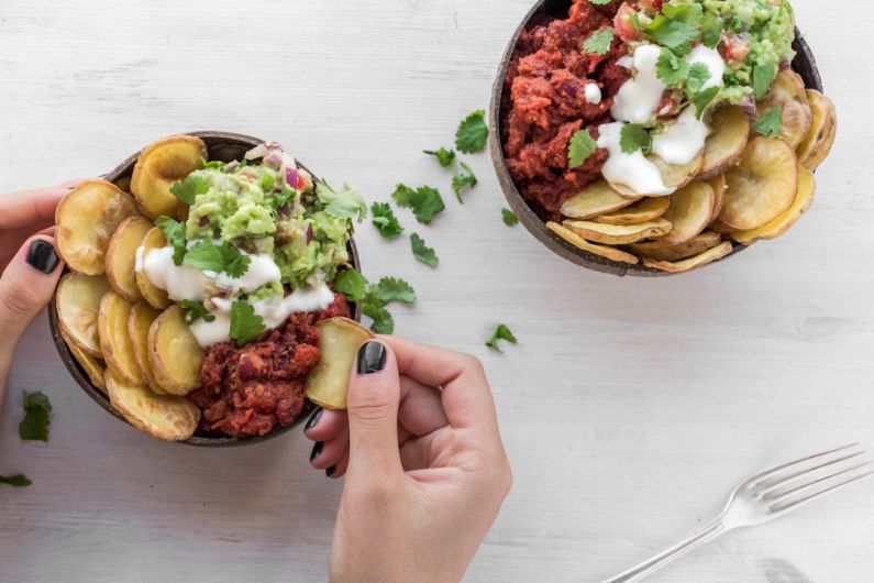 Nail Health - person eating vegetable dish